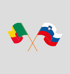 Crossed And Waving Flags Of Benin And Slovenia