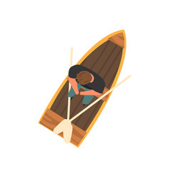 Man Sitting In Wooden Boat Top View