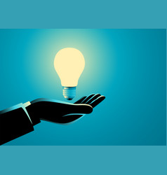 Businessman Hand Holding A Light Bulb