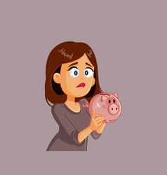 Unhappy Broke Woman Holding Piggy Bank