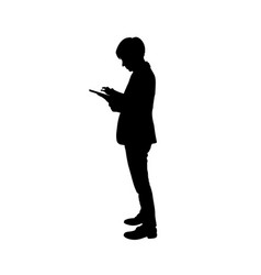 Silhouette Of A Person Standing Holding