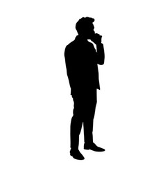 Silhouette Of A Person Standing Holding