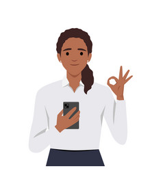 Young Happy Woman Shows Smartphone With Ok Sign