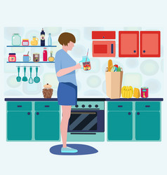 Young Woman In Interior Kitchen With Cooking