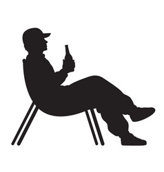 Silhouette Of A Man Sitting In A Chair