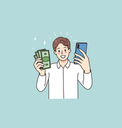 Smiling Man Holding Smartphone And Money