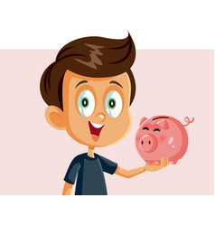 Happy Boy Holding A Piggy Bank