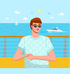 Positive Young Man In Sunglasses Standing On The