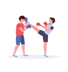 Two Men Boxers Exercising Thai Boxing In Red