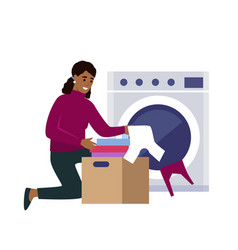 African American Woman Doing Laundry At Home