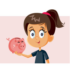 Happy Girl Holding A Piggy Bank