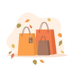 Shopping Bags With Falling Autumn Leaves Around