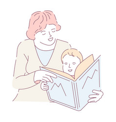 Mother Doing Homework With Son Reading Alphabet