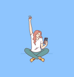 Overjoyed Woman With Mobile Phone Sits On Floor