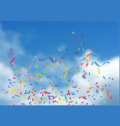 Confetti And Streamers On Blue Sky Background