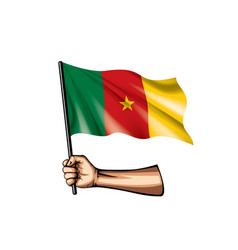 Cameroon Flag And Hand On White Background