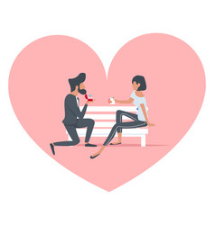 Man Proposing To A Woman Sitting Bench