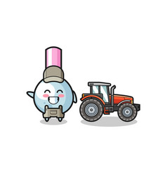 Cotton Bud Farmer Mascot Standing Beside A Tractor