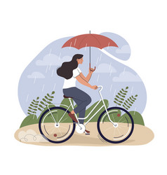 Woman On Bicycle Under Rain