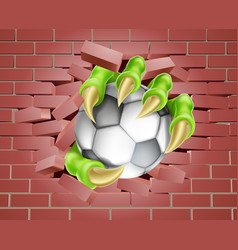 Claw With Soccer Ball Breaking Through Brick Wall