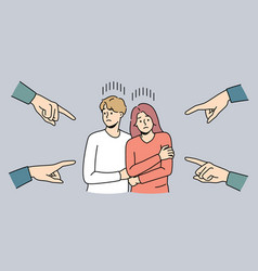 Hands Pointing At Unhappy Young Couple