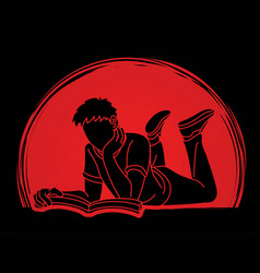 A Man Laying Down And Reading Book