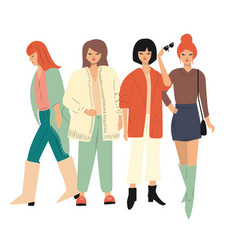 Four Young Women In Autumn Clothes Standing