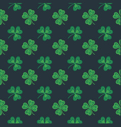 Seamless Pattern Of Clover Leaves On A Dark