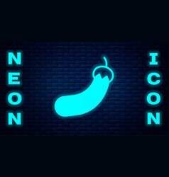 Glowing Neon Eggplant Icon Isolated On Brick Wall