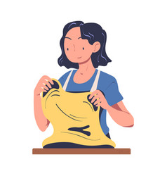 Woman Baker In Apron Kneading Dough