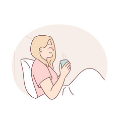 Woman Is Drinking Coffee Sitting In Bed Under