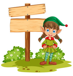 A Happy Elf Near Sign