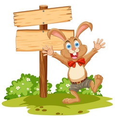 Happy Cartoon Rabbit Standing By A Signpost