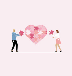 Couple Assembling Heart Symbol From Puzzle Pieces