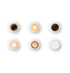 Top View At Different White Coffee Cups On Plates