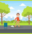 bully boy littering in park kids aggressive vector image