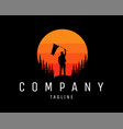 mountain climber logo holding flag with sunset vector image