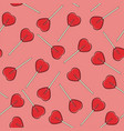 seamless background with red lollipop candies vector image