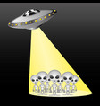 space aliens in the rays of spaceship vector image