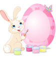 easter bunny painting egg vector image vector image