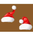 two santa clous christmas hats vector image vector image