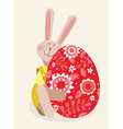 rabbit with easter egg vector image vector image