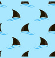 shark fin silhouette icon and blue waves isolated vector image