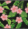 hibiscus monstera palm leaves seamless black vector image vector image