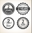 two years warranty retro vintage badge and labels vector image vector image
