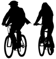 young couple riding bicycles silhouettes vector image vector image