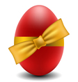 red easter egg with yellow bow vector image