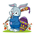 rabbit paint the easter egg vector image