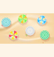 set of colorful beach umbrellas on the background vector image