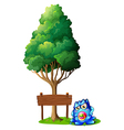 a baby monster with pacifier standing near vector image vector image